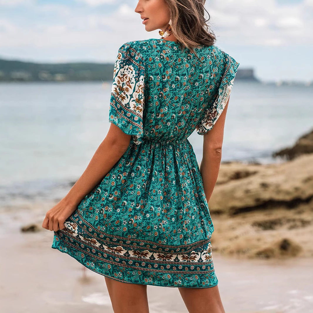 Robe verte bohème en rayonne à motif floral positionné.