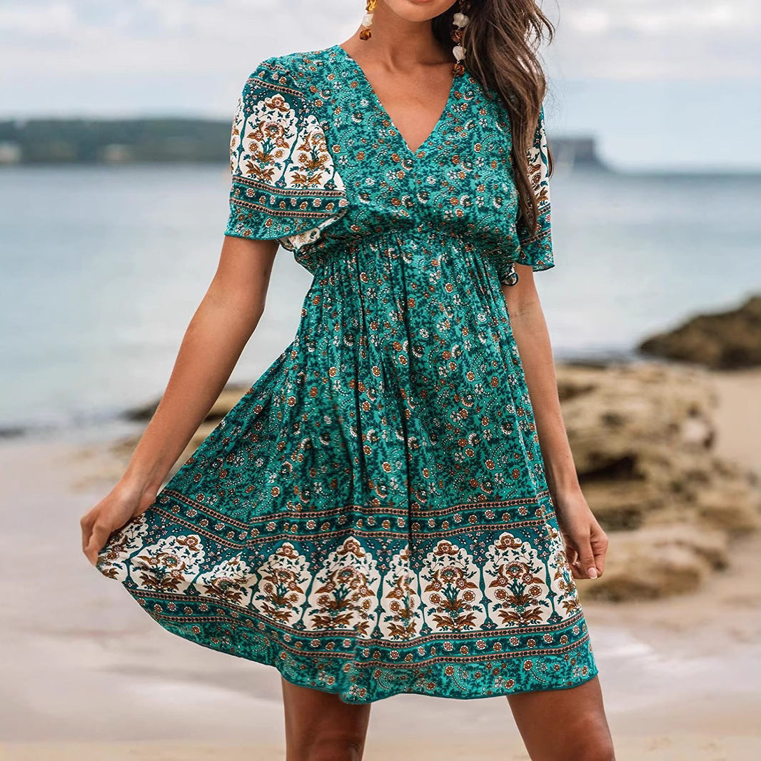 Robe verte bohème en rayonne à motif floral positionné.